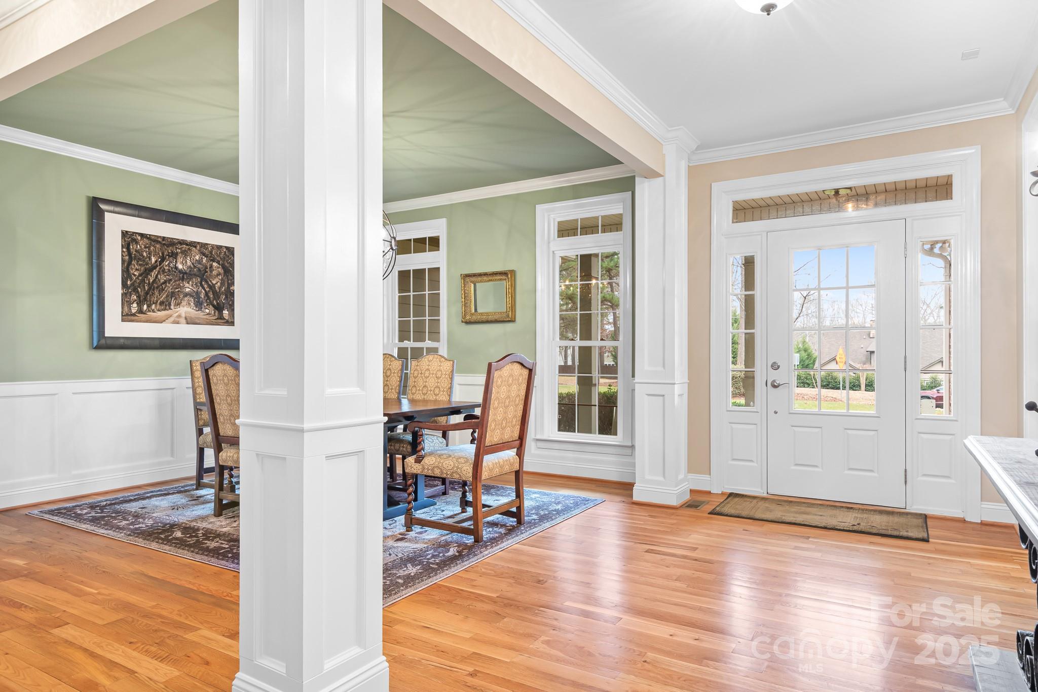 302 McCrary Road Mooresville, NC 28117 - Photo 4 of 34 a view of a livingroom with wooden floor and furniture