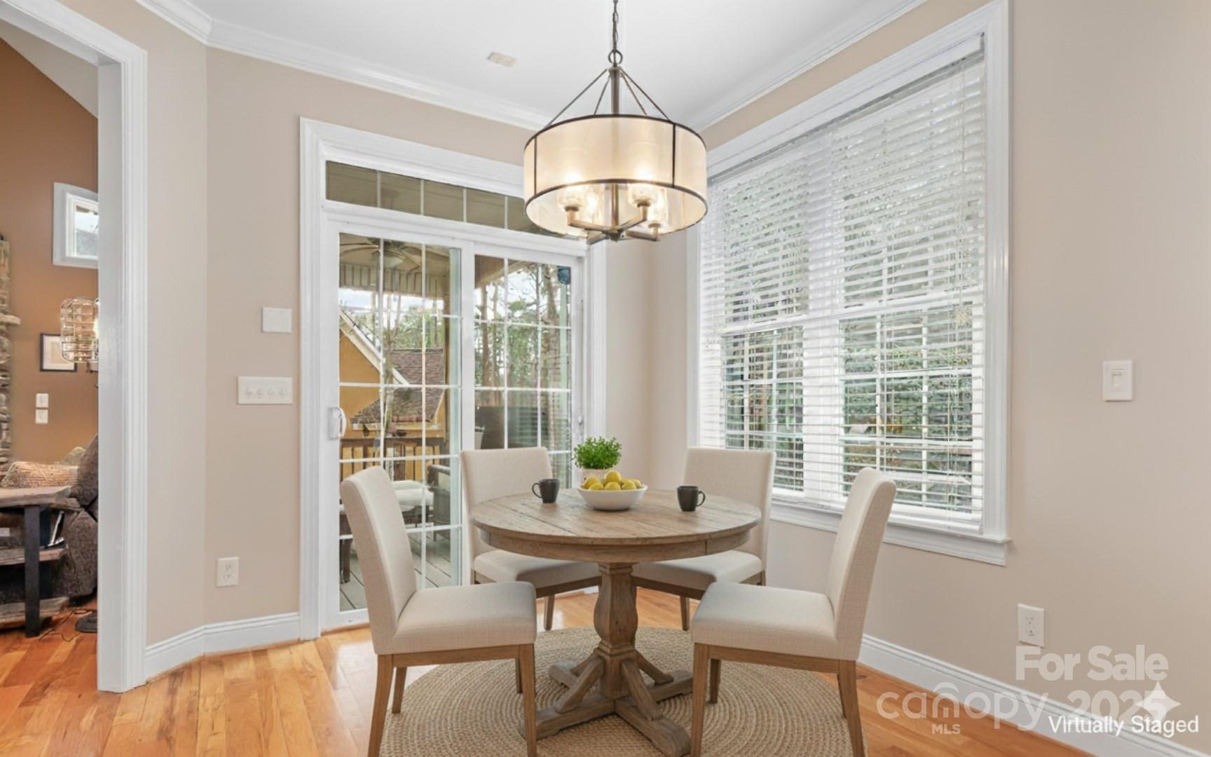 302 McCrary Road Mooresville, NC 28117 - Photo 10 of 34 a view of a dining room with furniture window and outside view
