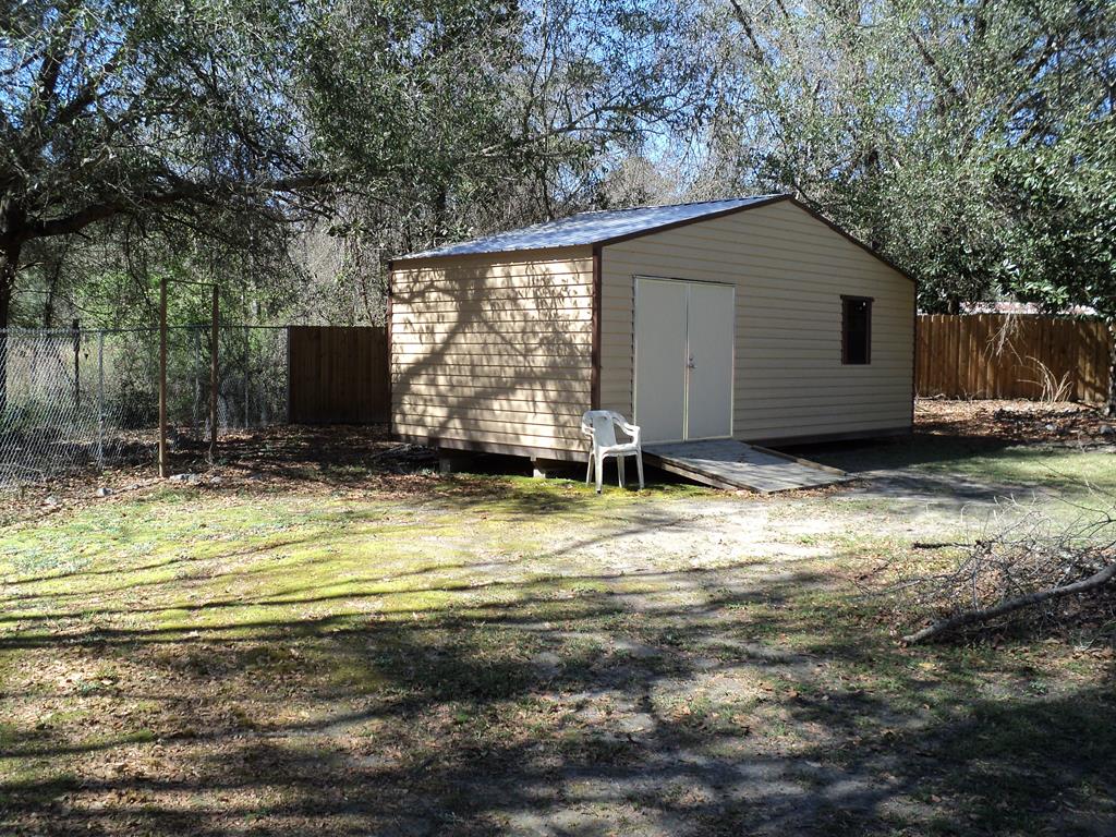 74 Kitetown Loop Seale, AL 36875 - Photo 23 of 28 a view of a house with backyard swimming pool and sitting area
