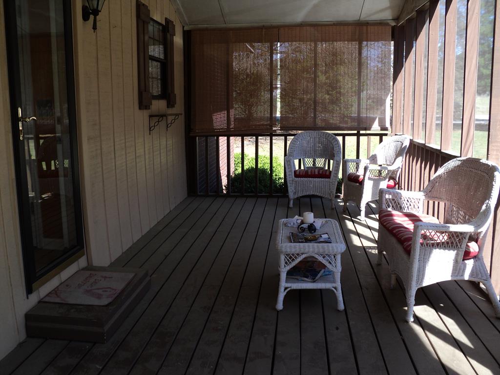 74 Kitetown Loop Seale, AL 36875 - Photo 25 of 28 a view of a chairs and table in a balcony