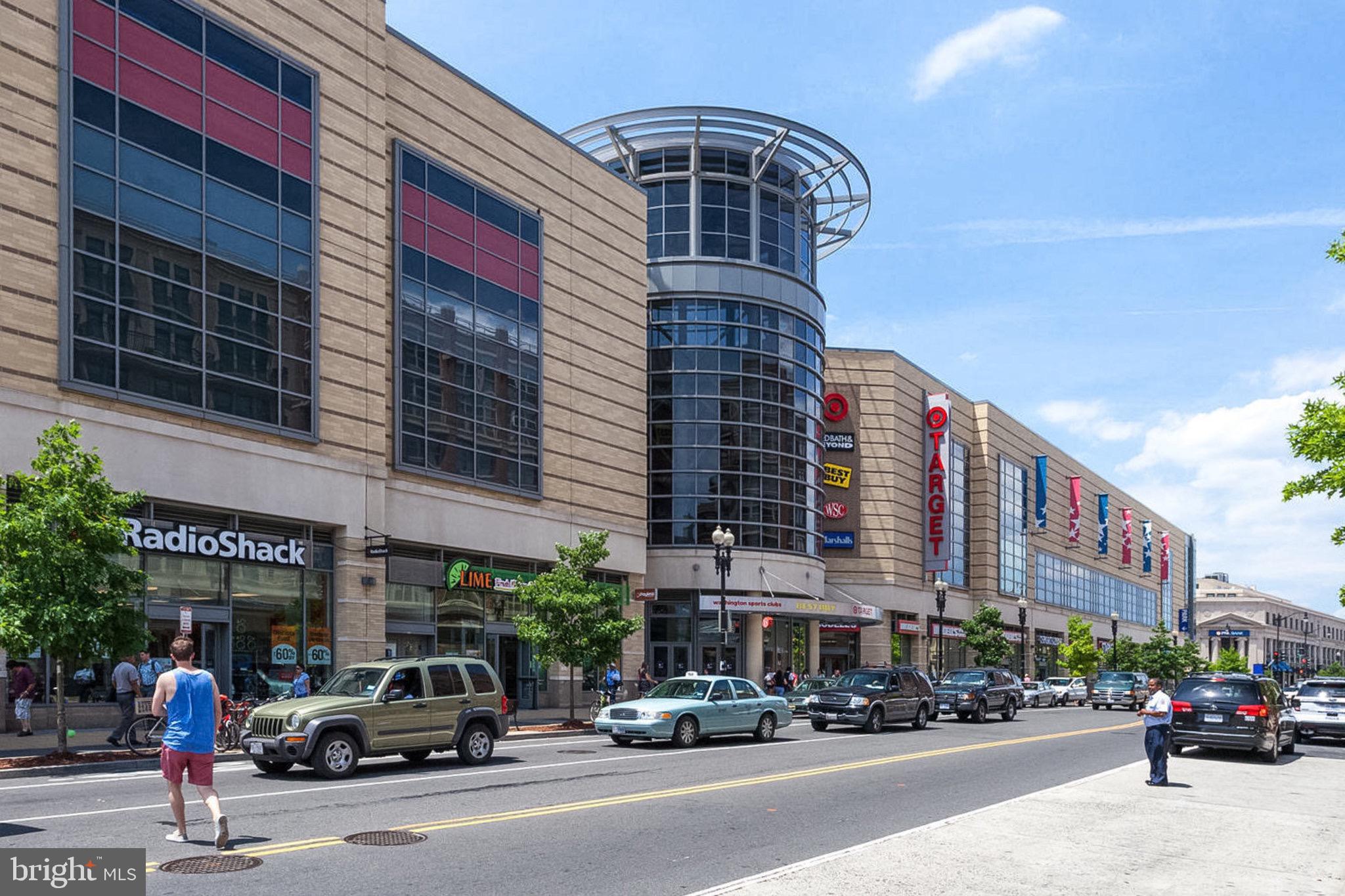 1438 Columbia Road Northwest, Unit 101 Washington, DC 20009 - Photo 32 of 39 a buildings with car parked in front of it