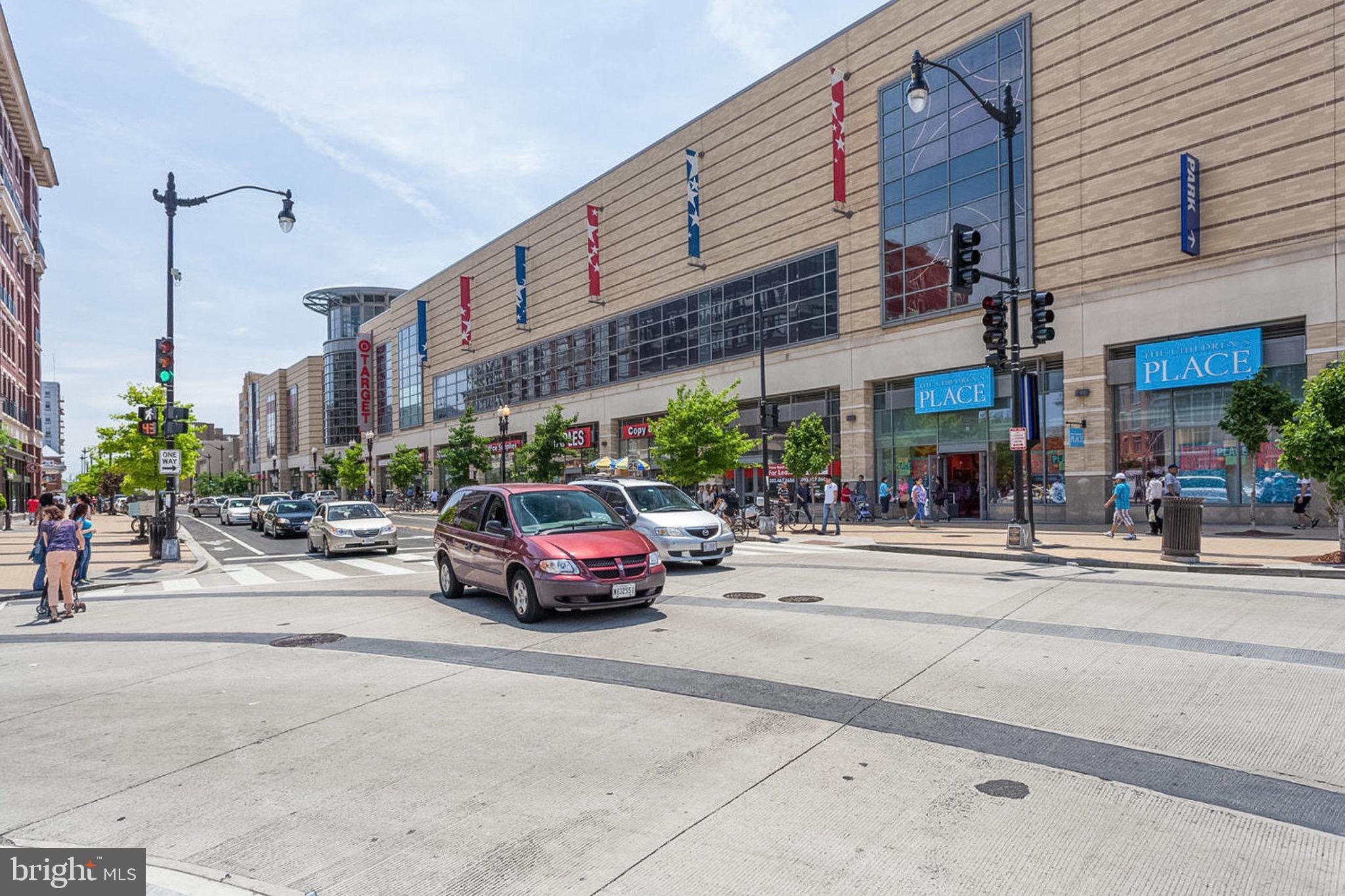 1438 Columbia Road Northwest, Unit 101 Washington, DC 20009 - Photo 34 of 39 a car parked in front of a building