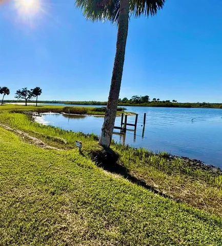 a view of a lake with a beach