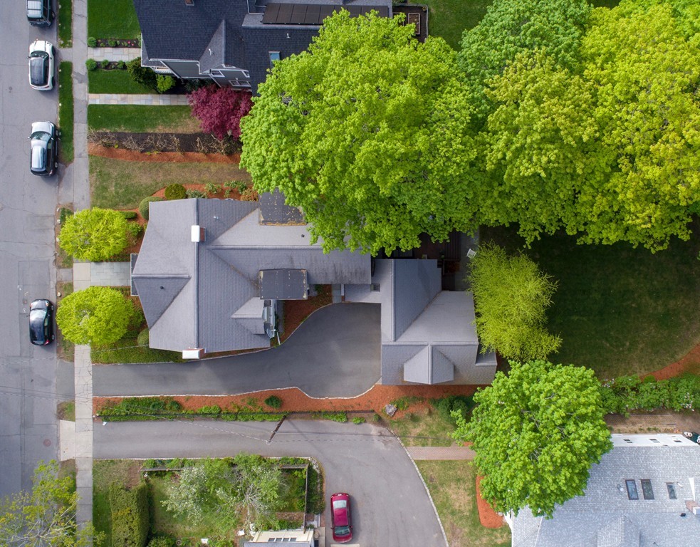 45 Parker Street Lexington, MA 02421 - Photo 18 of 20 an aerial view of a house with swimming pool and garden