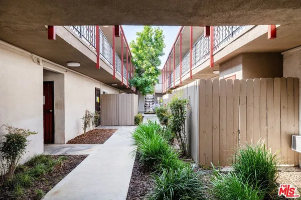 a view of a back yard of the house