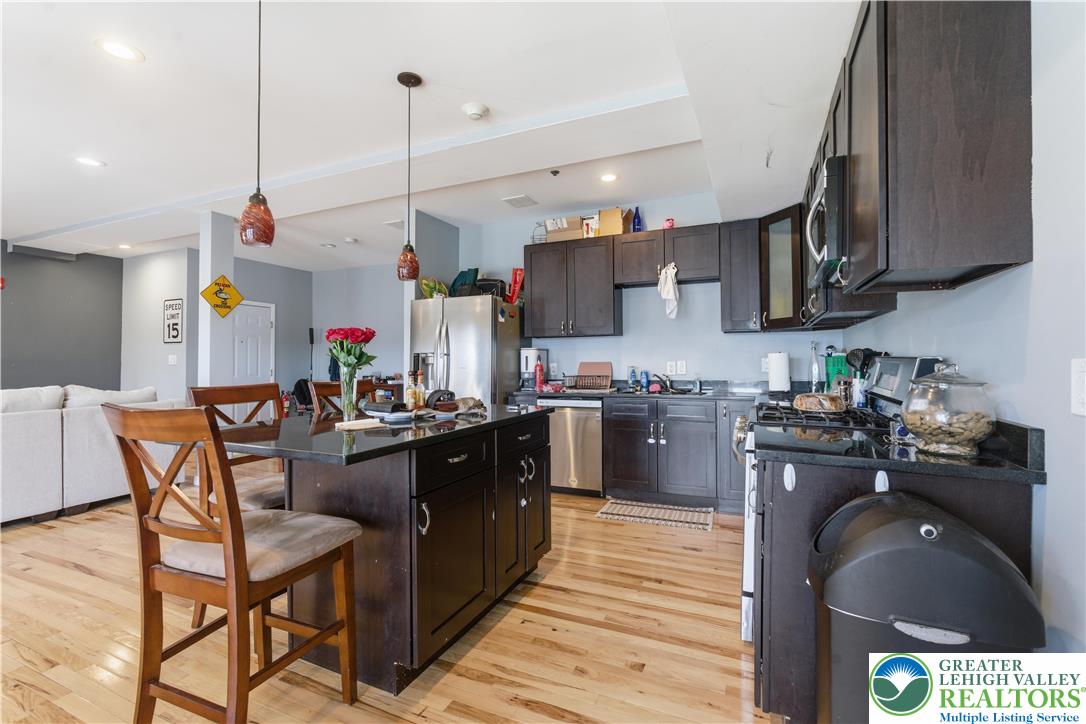 623 Walnut Street, Unit A2 Easton, PA 18042 - Photo 6 of 21 a kitchen with granite countertop lots of counter top space