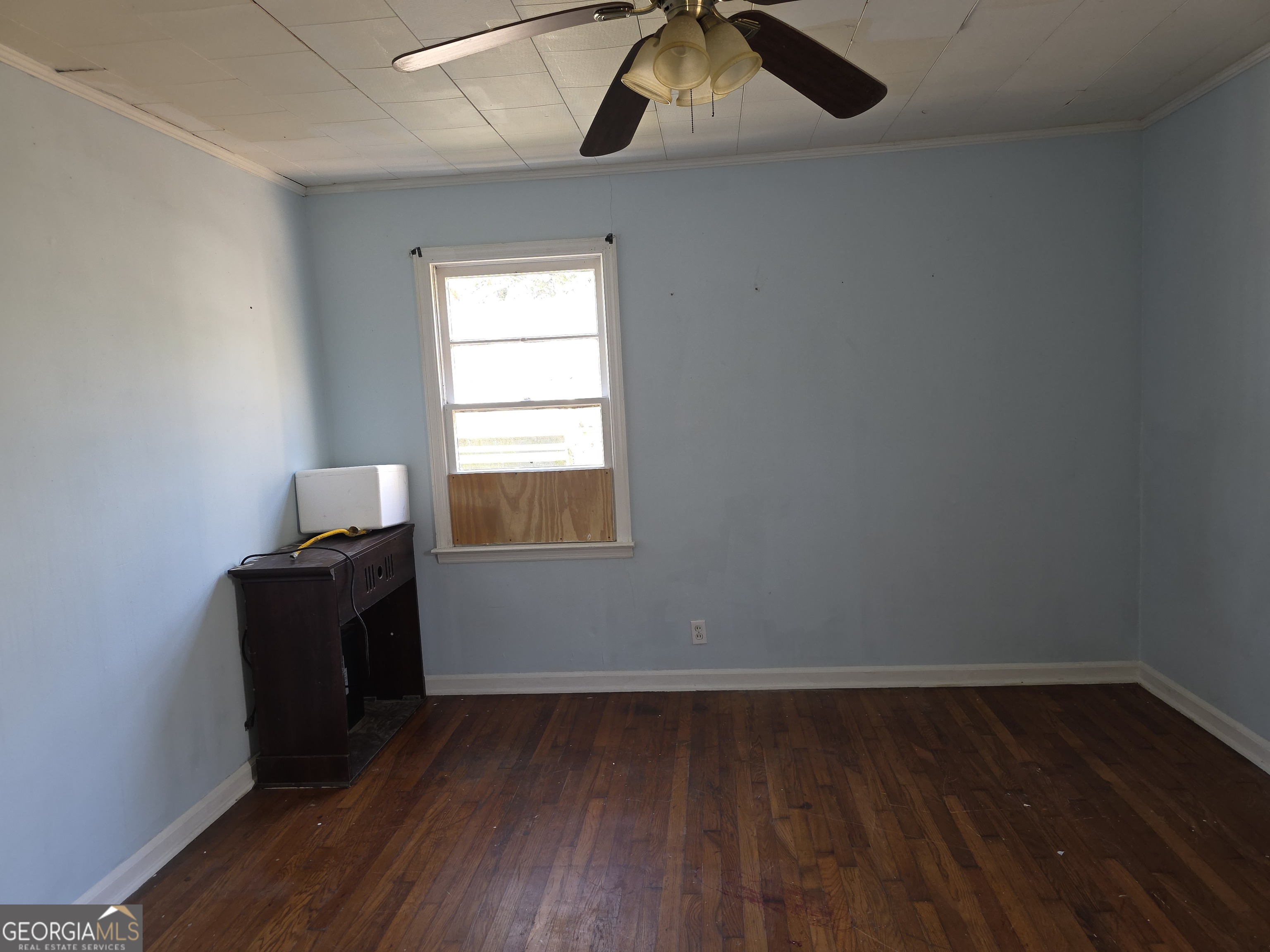 352 Harrison Road Tallapoosa, GA 30176 - Photo 4 of 12 a room with wooden floor and windows