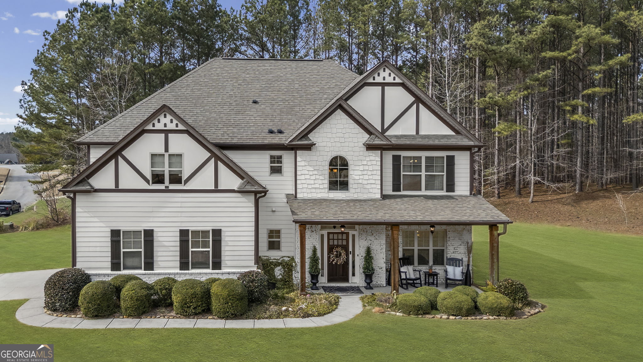 7 Harris Court Newnan, GA 30263 - Photo 1 of 64 a front view of a house with a yard and garage
