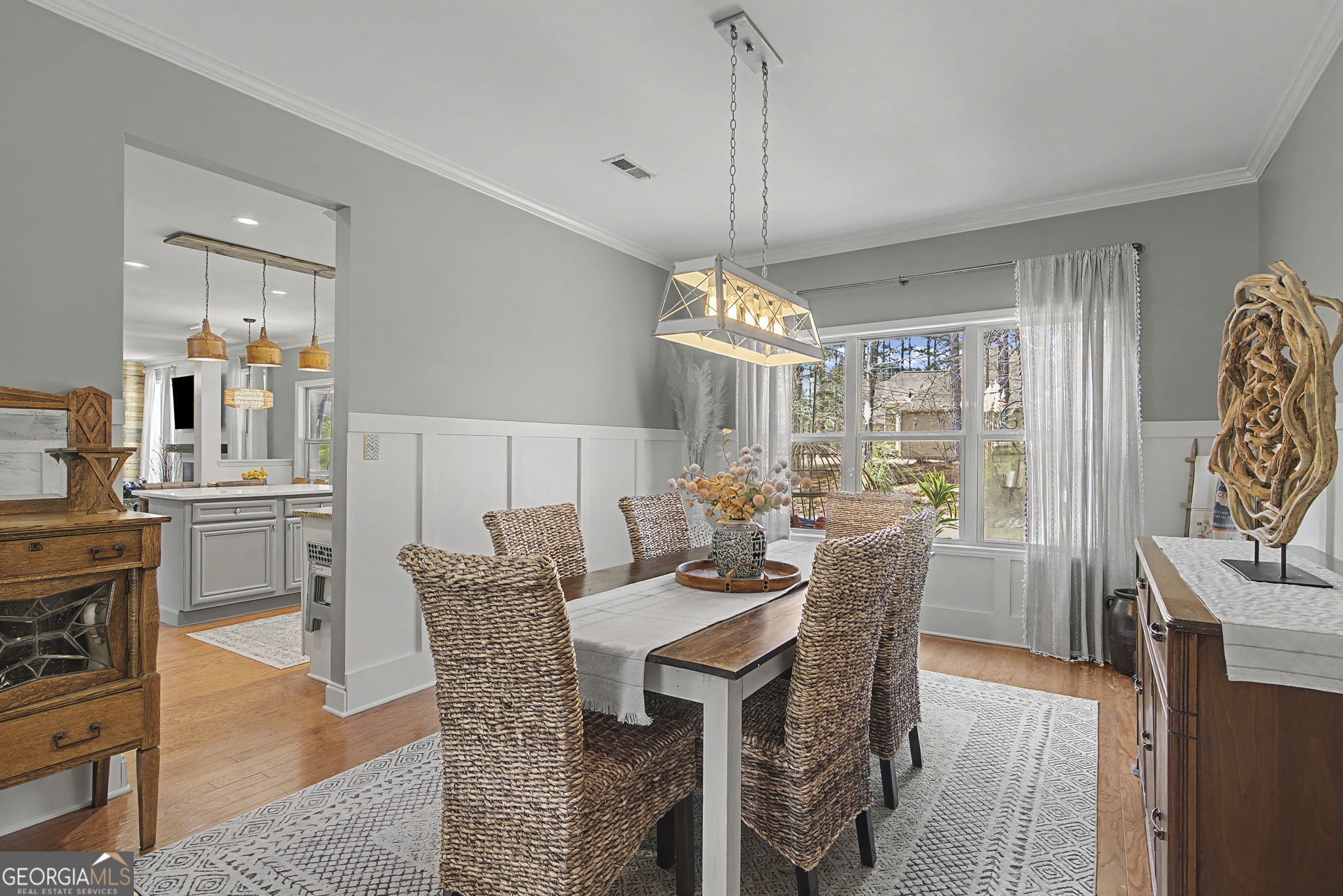 7 Harris Court Newnan, GA 30263 - Photo 15 of 64 a view of a dining room with furniture window and wooden floor