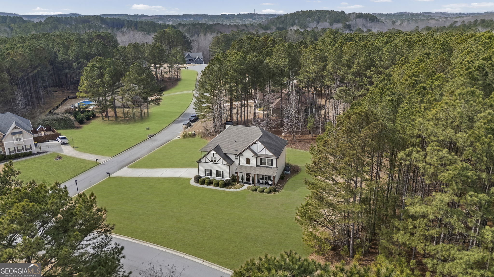7 Harris Court Newnan, GA 30263 - Photo 3 of 64 an aerial view of a house with a garden