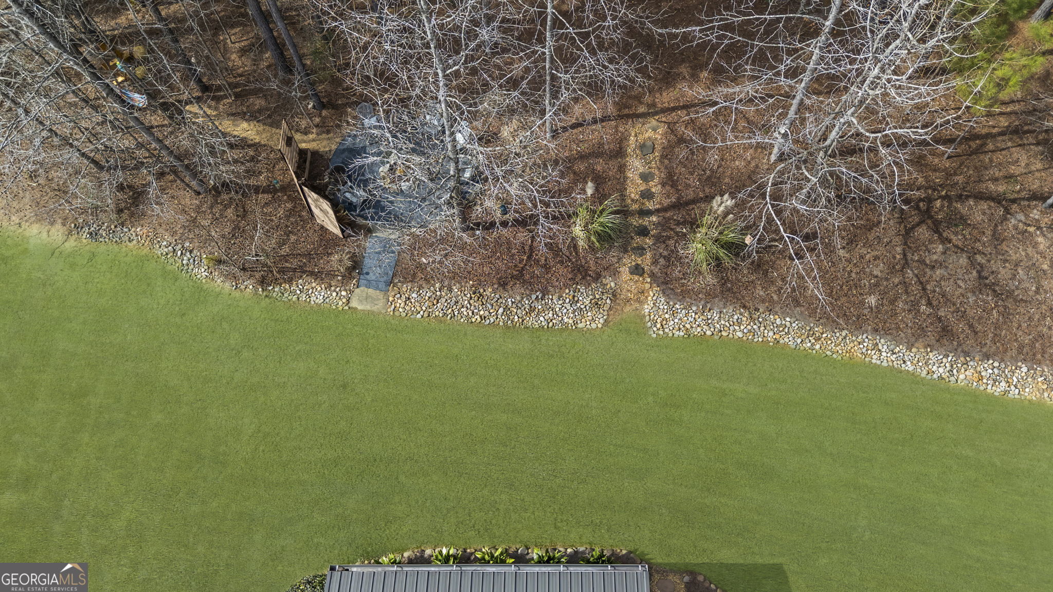 7 Harris Court Newnan, GA 30263 - Photo 61 of 64 a view of a field of grass and trees