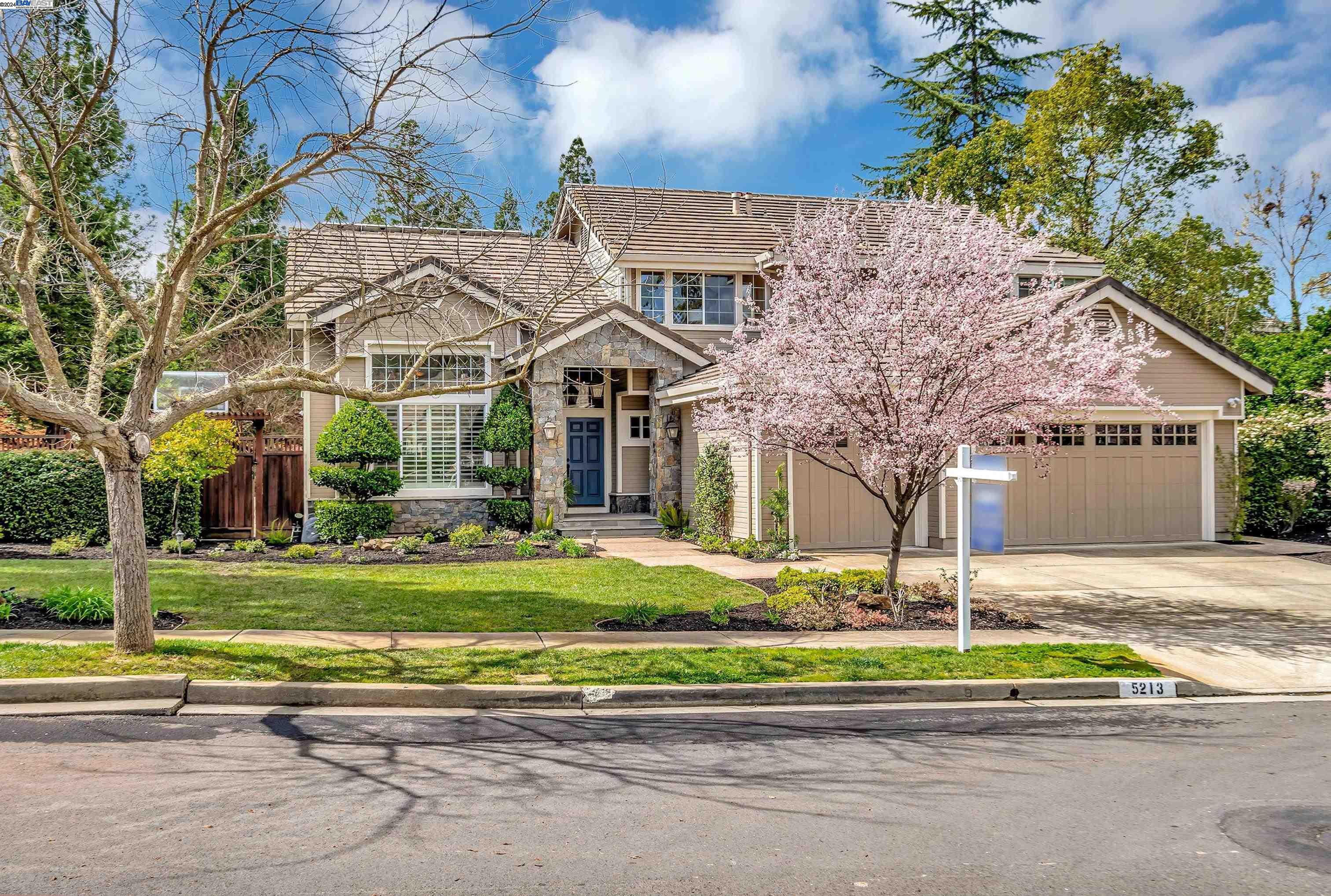 5213 Independence Drive Pleasanton, CA 94566 - Photo 1 of 1 a front view of a house with a yard