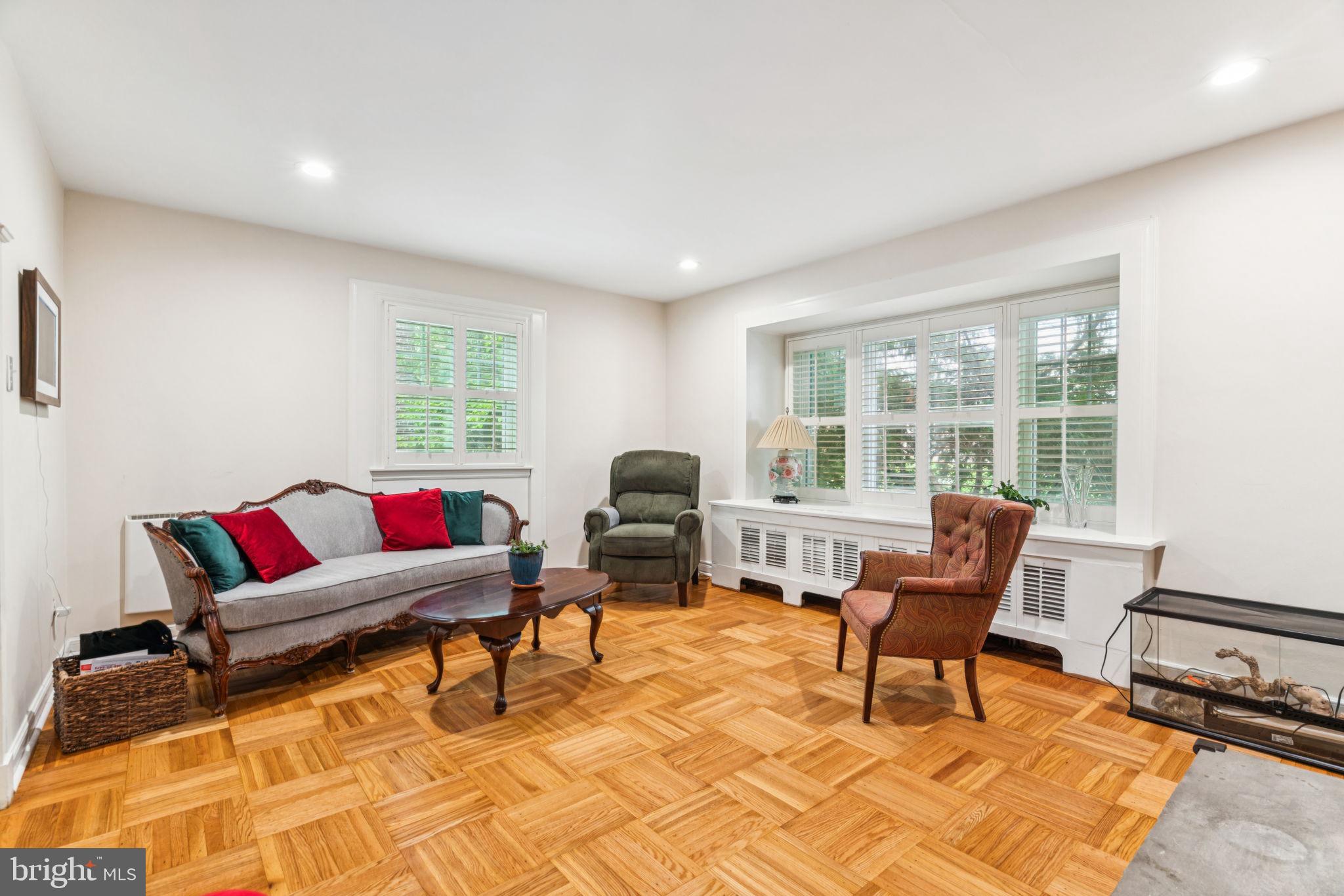 6768 Stenton Avenue Philadelphia, PA 19119 - Photo 25 of 76 a living room with furniture and a window