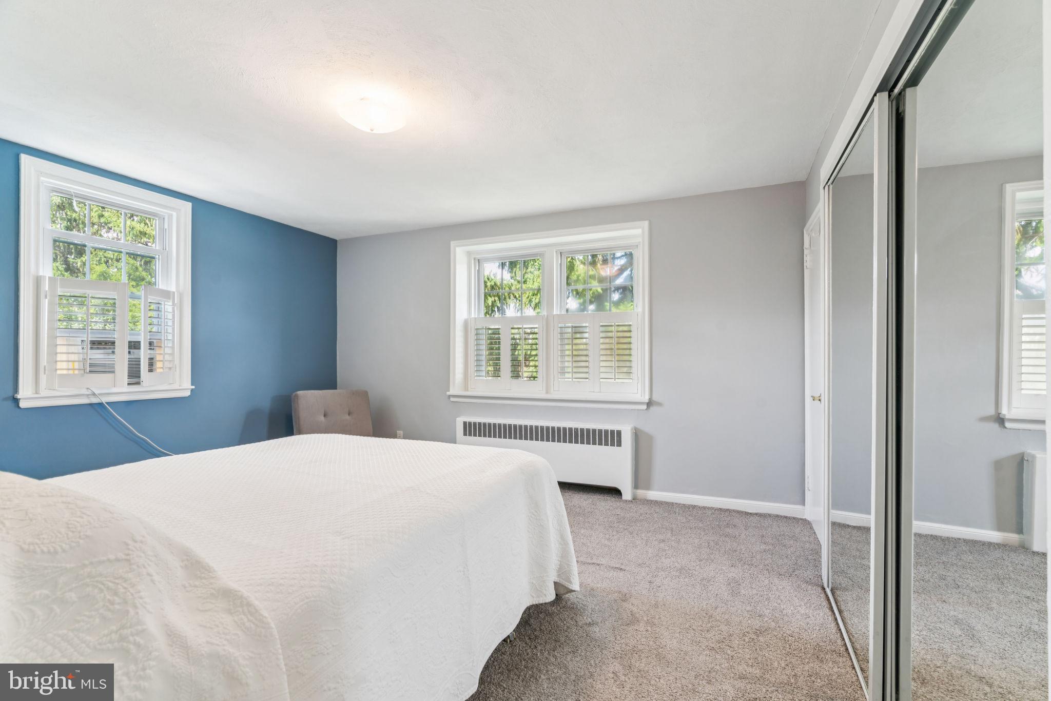 6768 Stenton Avenue Philadelphia, PA 19119 - Photo 58 of 76 a bedroom with a bed and a window