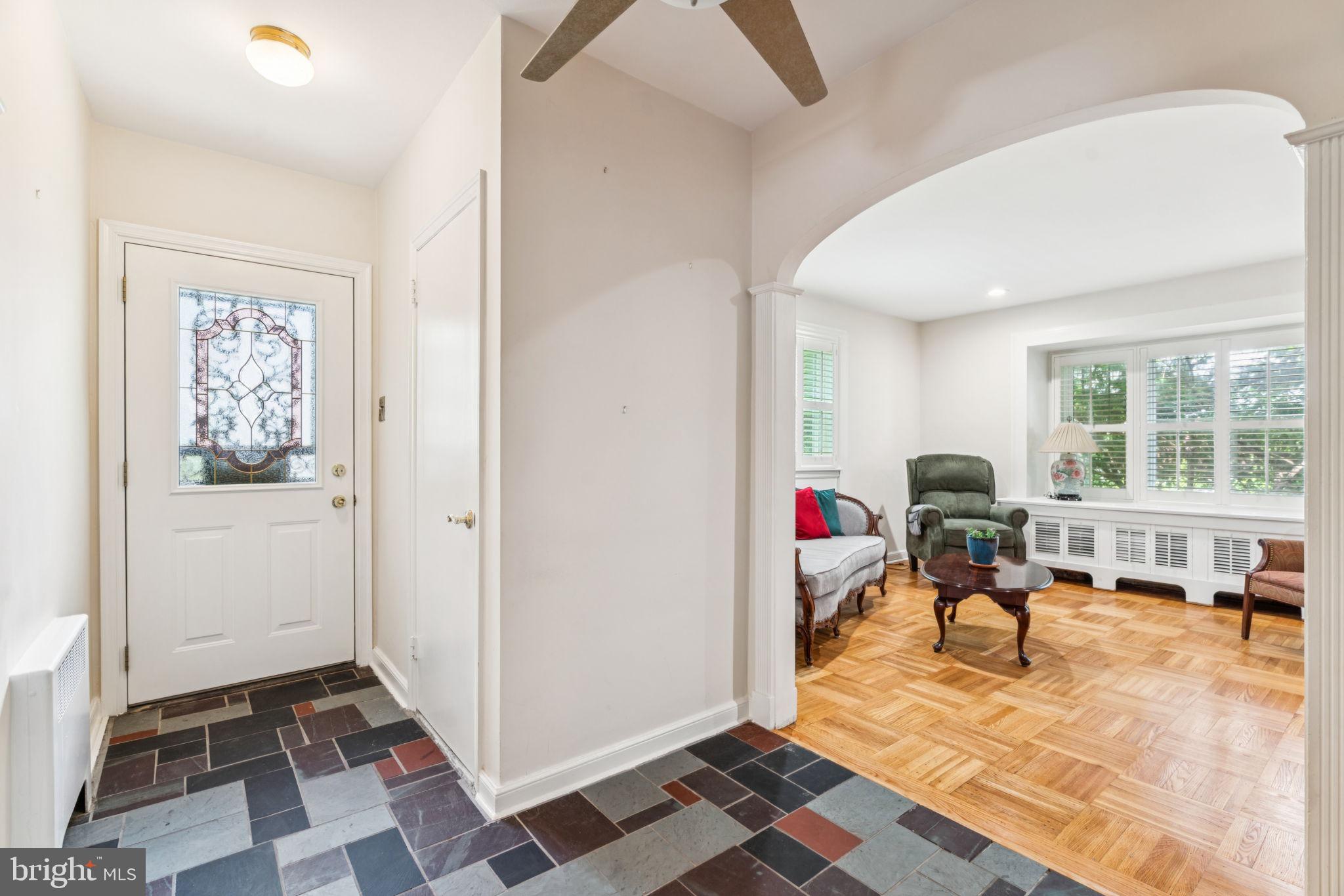 6768 Stenton Avenue Philadelphia, PA 19119 - Photo 6 of 76 a living room with furniture and a window