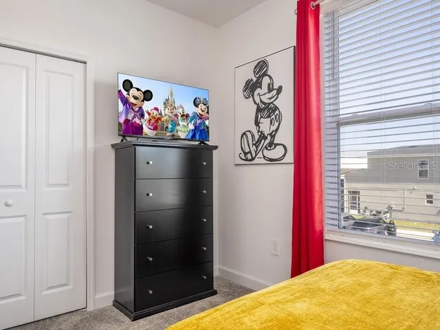 an aerial view of a house with yard swimming pool and outdoor seating
