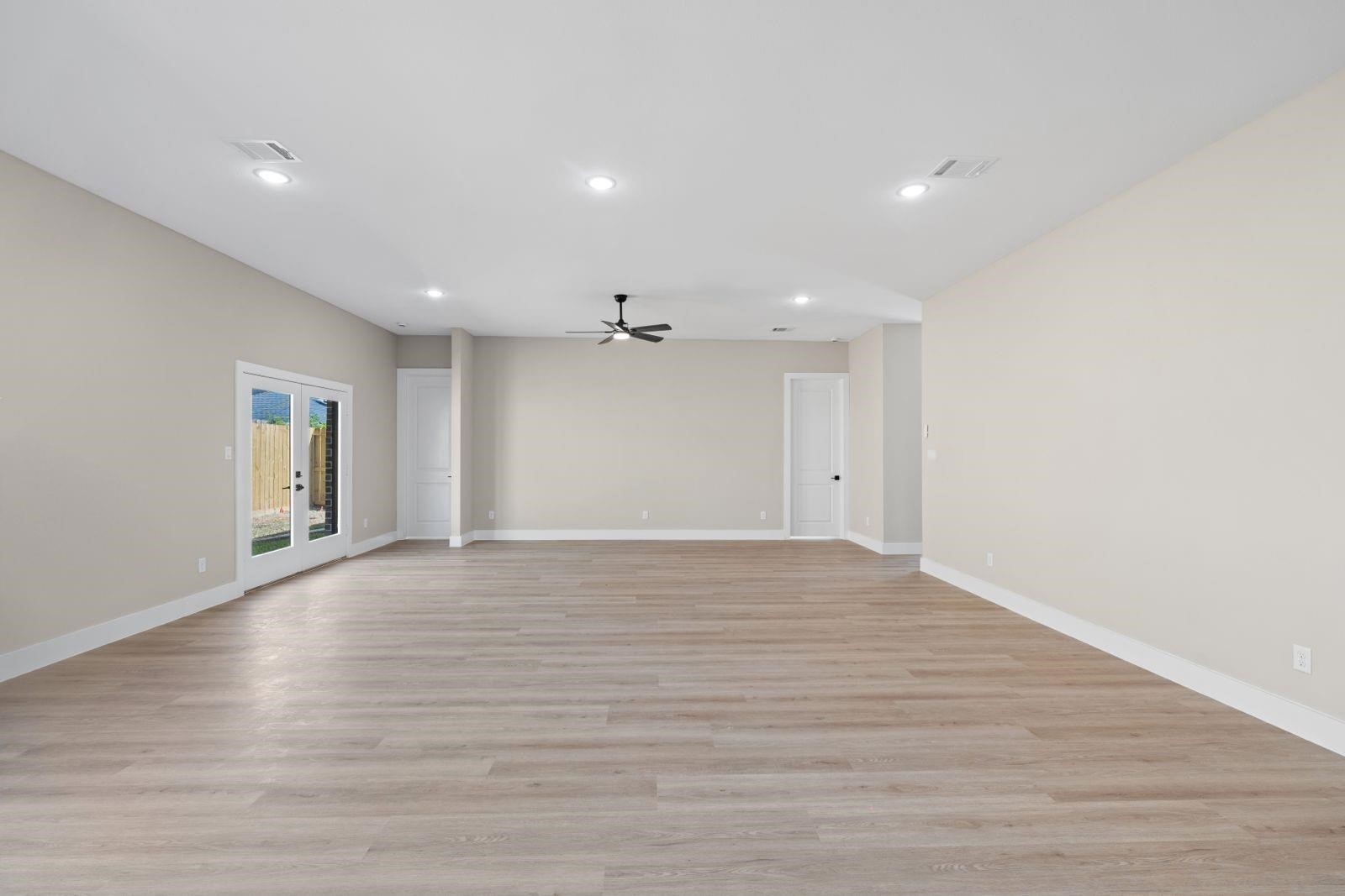 2607 Piemonte Avenue Cir Spring Spring, TX 77388 - Photo 13 of 18 a view of an empty room with wooden floor