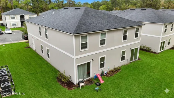 a view of a house with garden