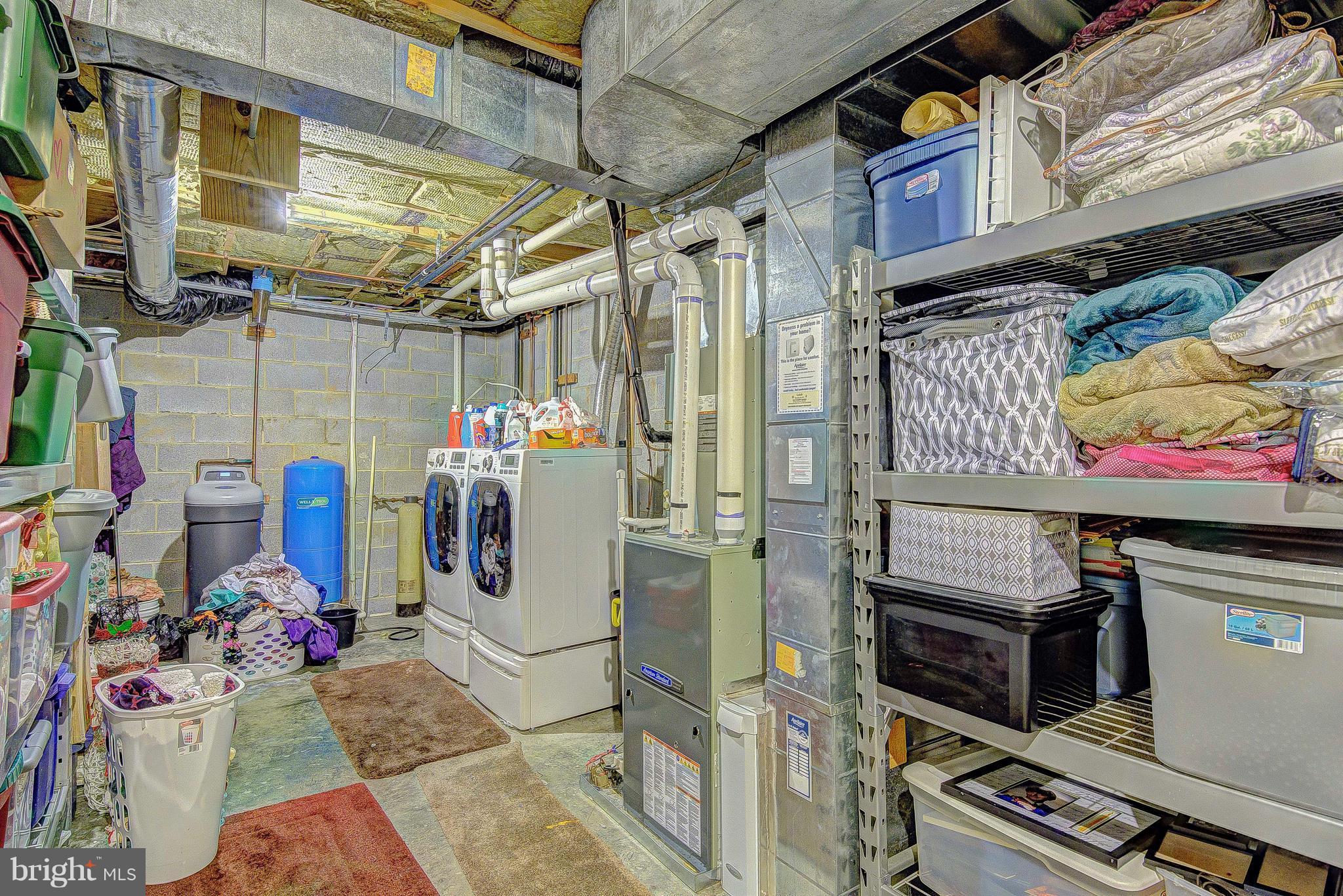 3315 Crane Road Port Republic, MD 20676 - Photo 16 of 30 Basement laundry and storage area