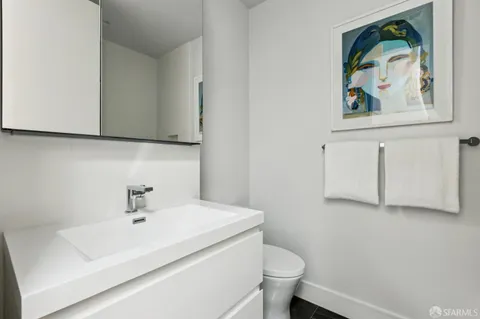 a bathroom with a sink and a toilet