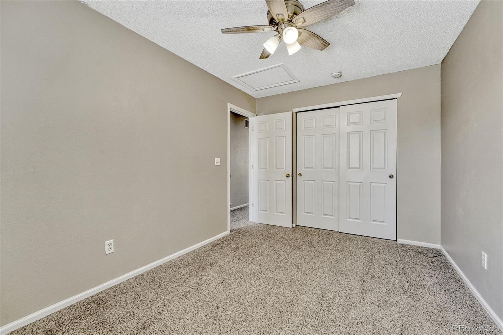 4927 Tarcoola Lane Highlands Ranch, CO 80130 - Photo 17 of 30 wooden floor in an empty room