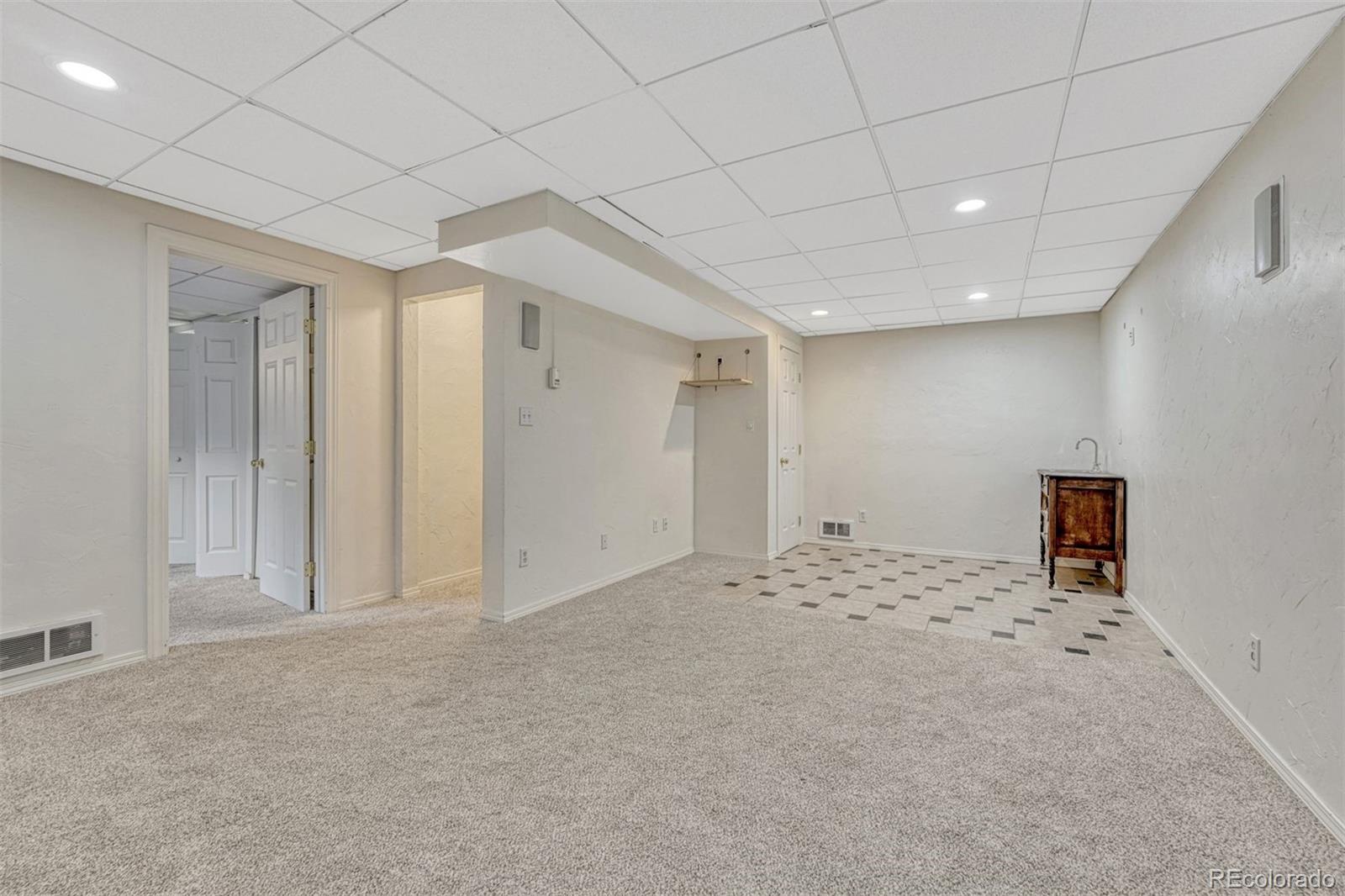 4927 Tarcoola Lane Highlands Ranch, CO 80130 - Photo 22 of 30 a view of livingroom with painted walls