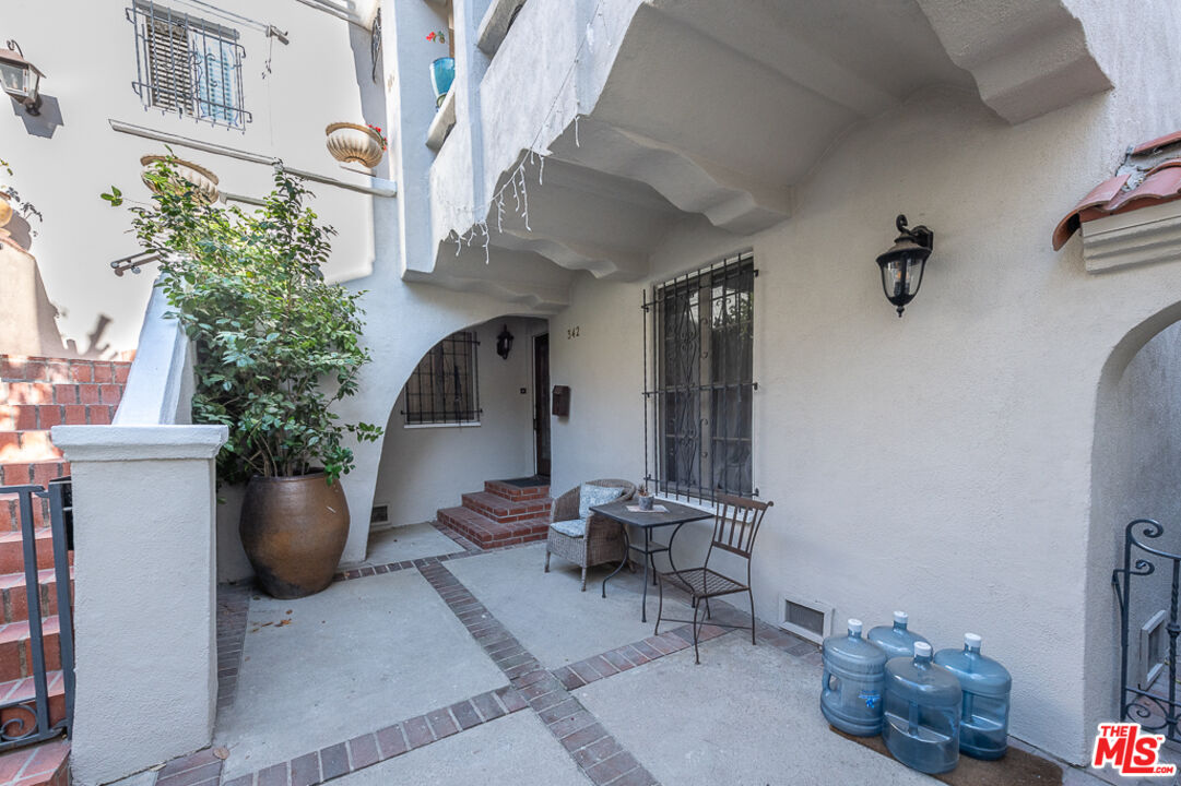 340 South Reeves Drive Beverly Hills, CA 90212 - Photo 16 of 35 a view of a living room and a couch
