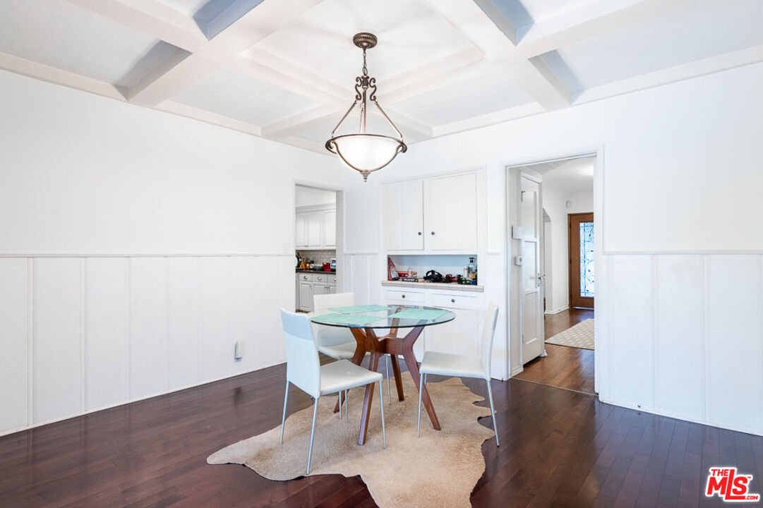 340 South Reeves Drive Beverly Hills, CA 90212 - Photo 26 of 35 a view of a dining room with furniture and wooden floor