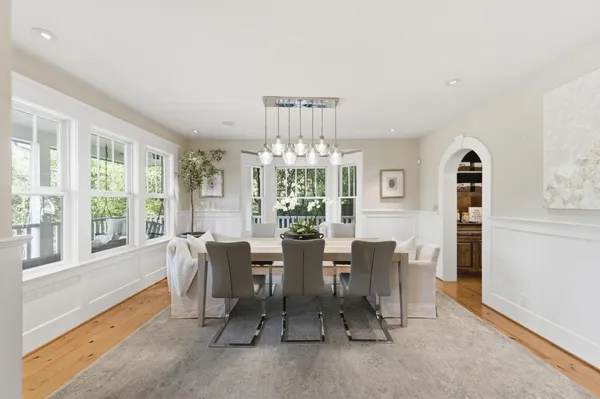 a kitchen with stainless steel appliances granite countertop a stove and a refrigerator