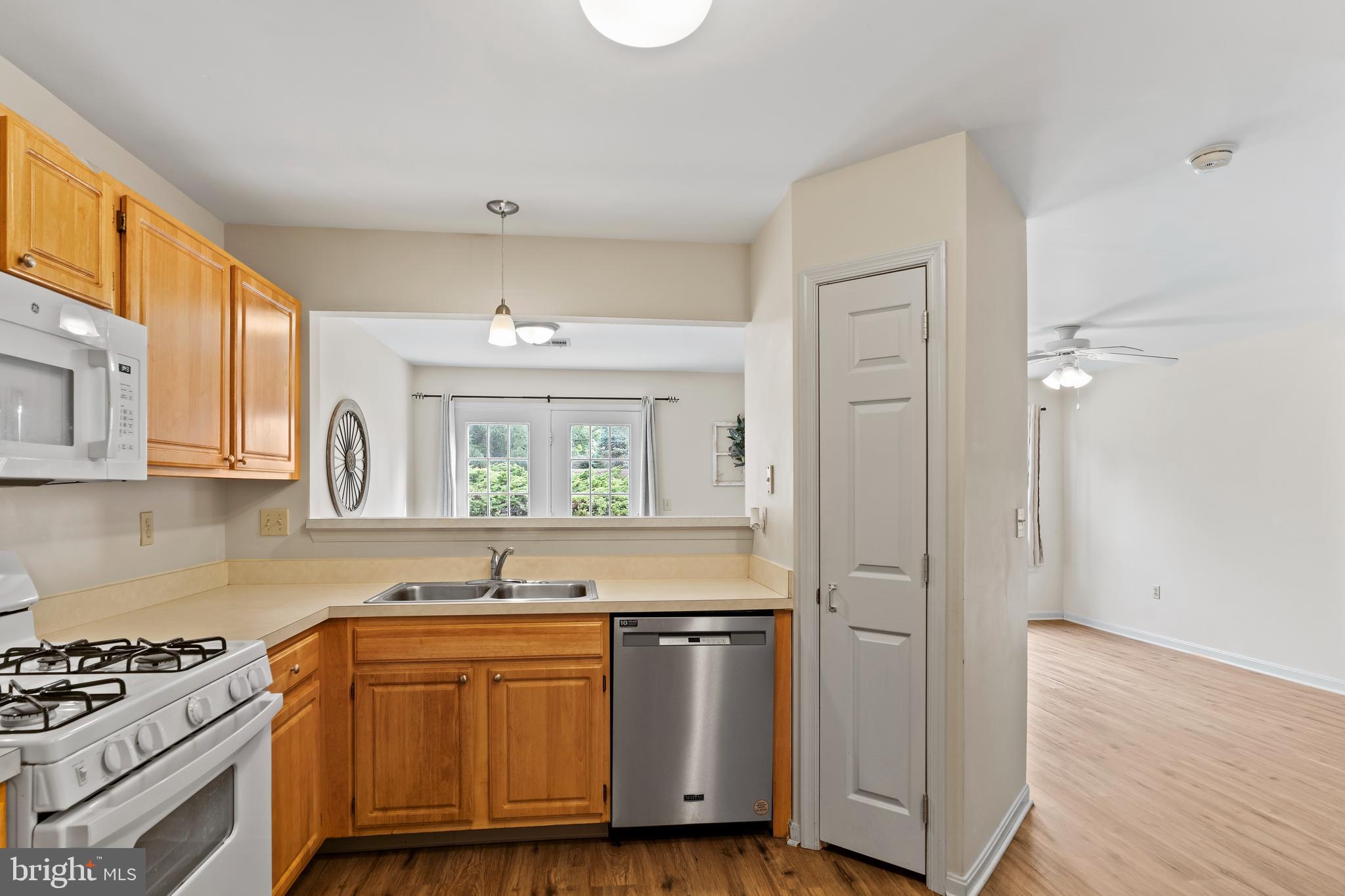 149 Cardinal Lane Hummelstown, PA 17036 - Photo 4 of 28 a kitchen with stainless steel appliances granite countertop a sink and cabinets