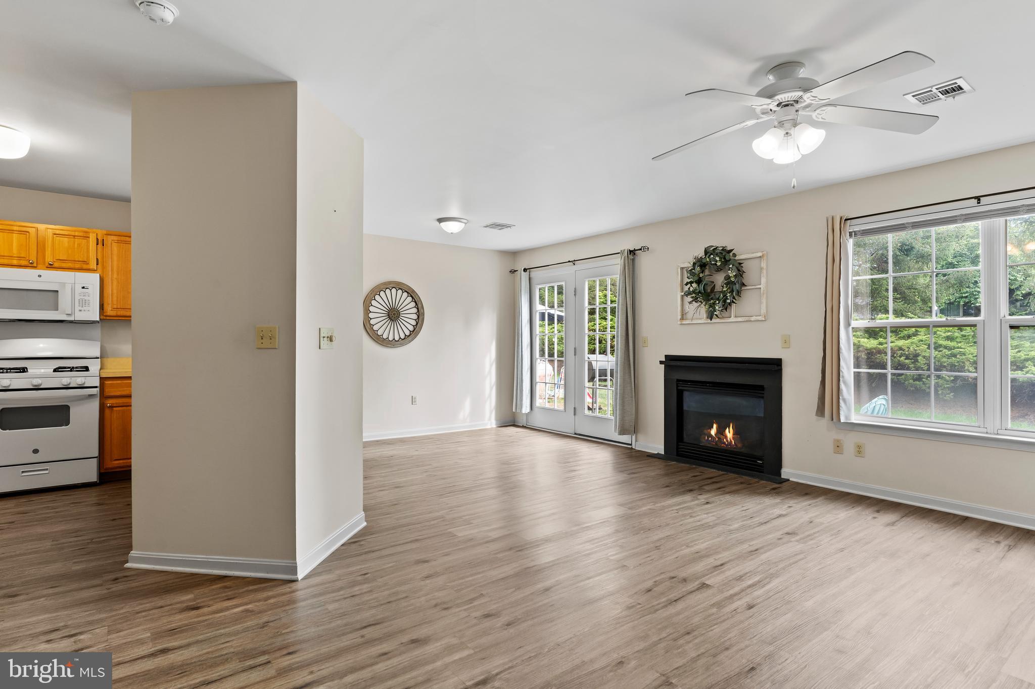 149 Cardinal Lane Hummelstown, PA 17036 - Photo 7 of 28 a view of an empty room with a window and fireplace