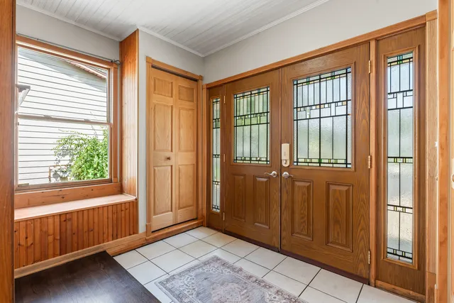 a view of an entryway with a window