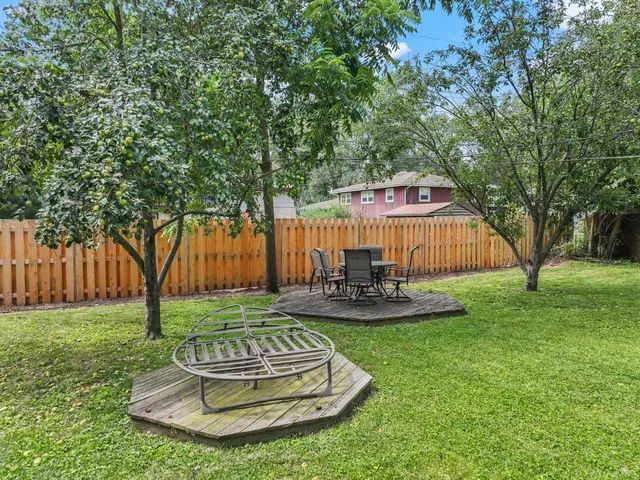 a garden view with a sitting space