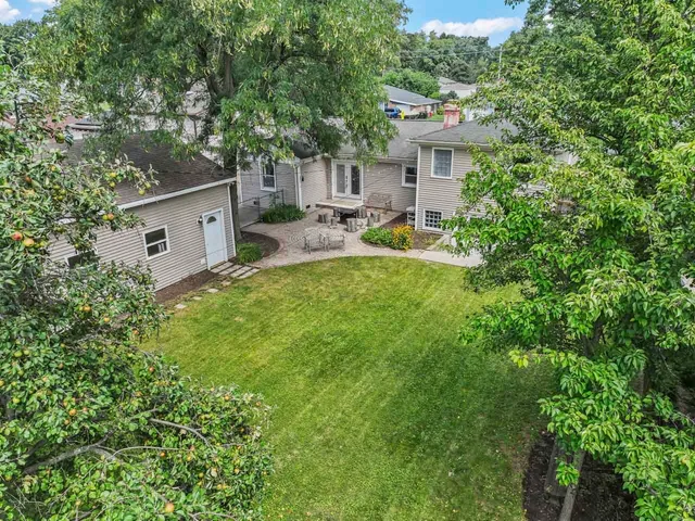 a house view with a garden space