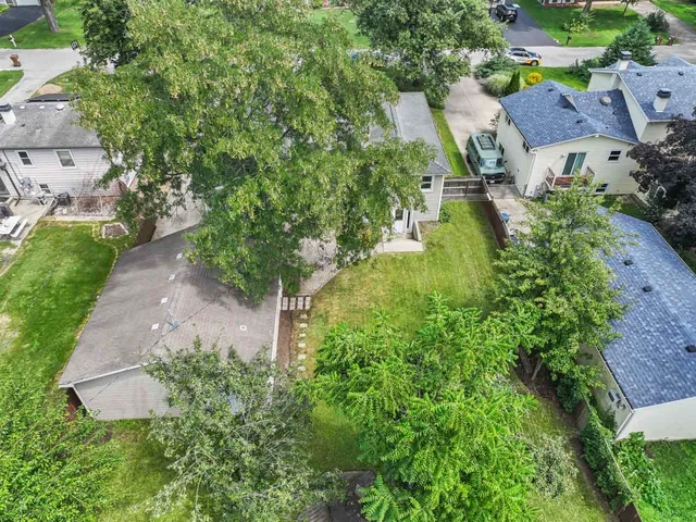 an aerial view of residential house with outdoor space