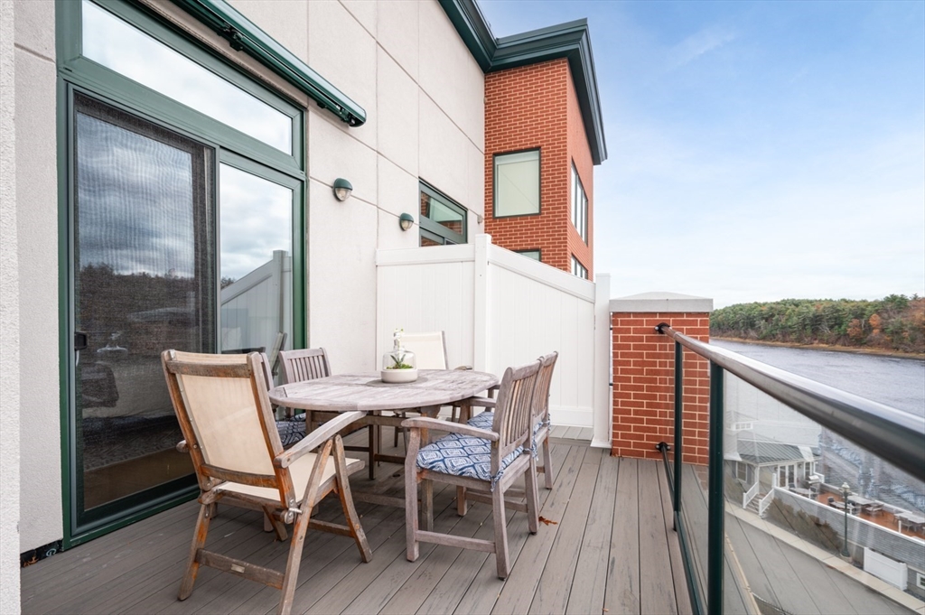 60 Merrimac Street, Unit 504 Amesbury, MA 01913 - Photo 32 of 37 a view of an outdoor seating area