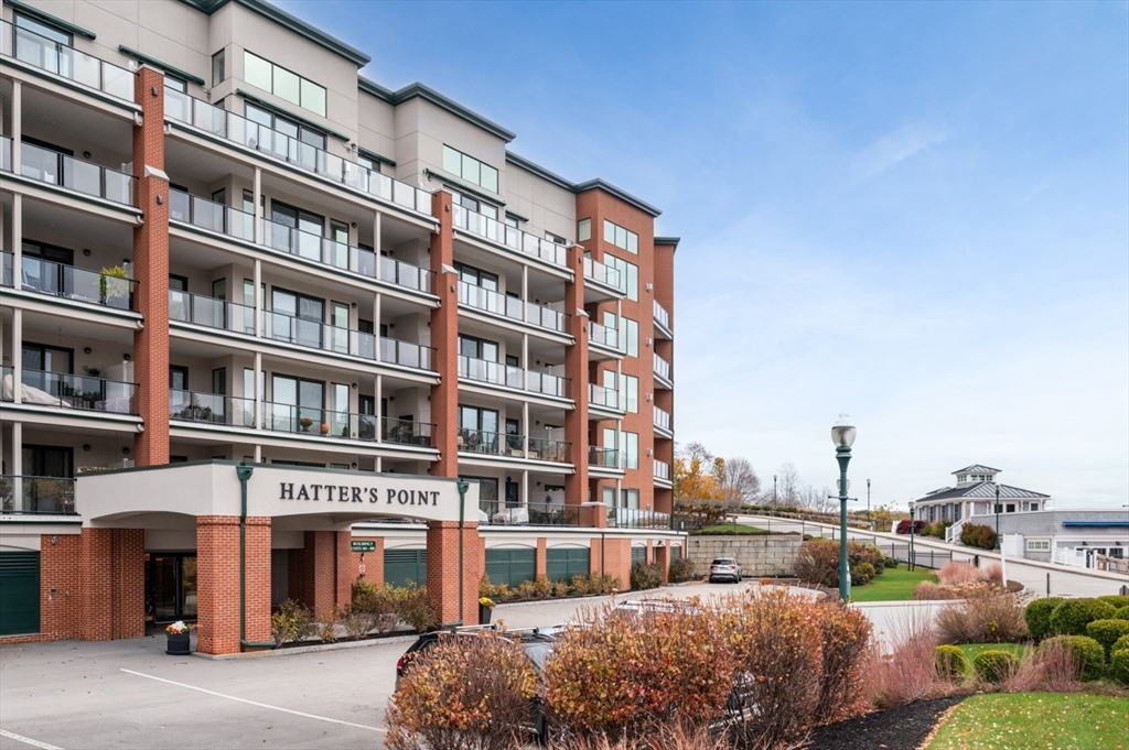 60 Merrimac Street, Unit 504 Amesbury, MA 01913 - Photo 4 of 37 a front view of a building with street view