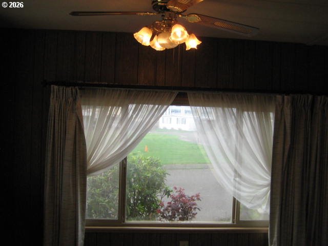 5355 River Road North, Unit 98 Keizer, OR 97303 - Photo 31 of 34 a view of room with window and stairs