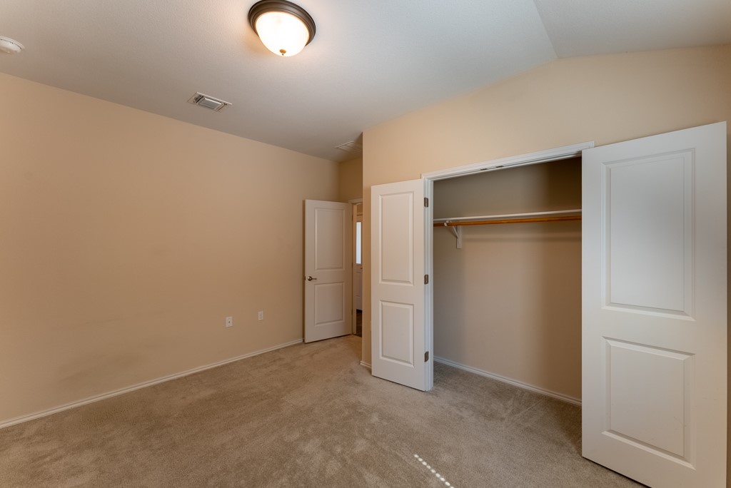 7304 Van Ness Street Austin, TX 78744 - Photo 11 of 37 an empty room with closet area