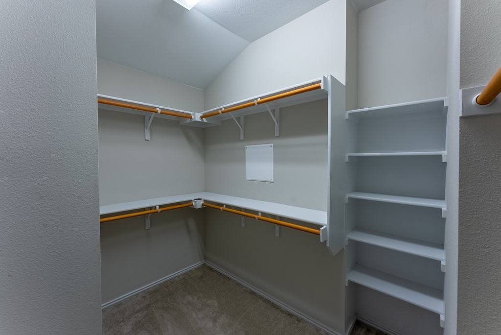 7304 Van Ness Street Austin, TX 78744 - Photo 22 of 37 a view of an empty walk in closet