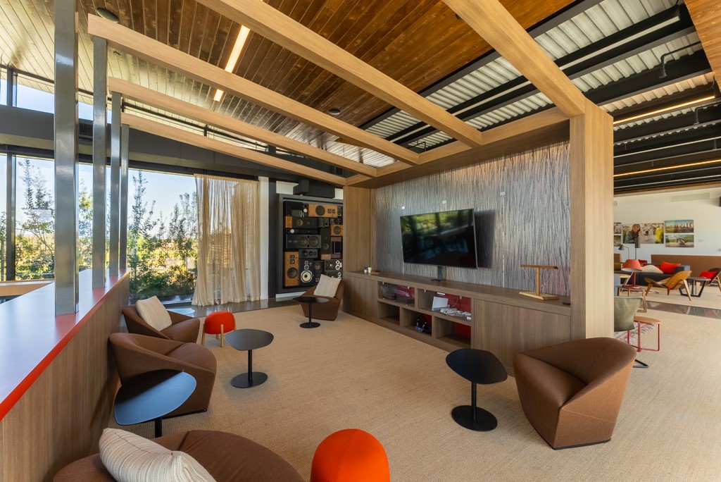 7304 Van Ness Street Austin, TX 78744 - Photo 29 of 37 a living room with furniture and a flat screen tv