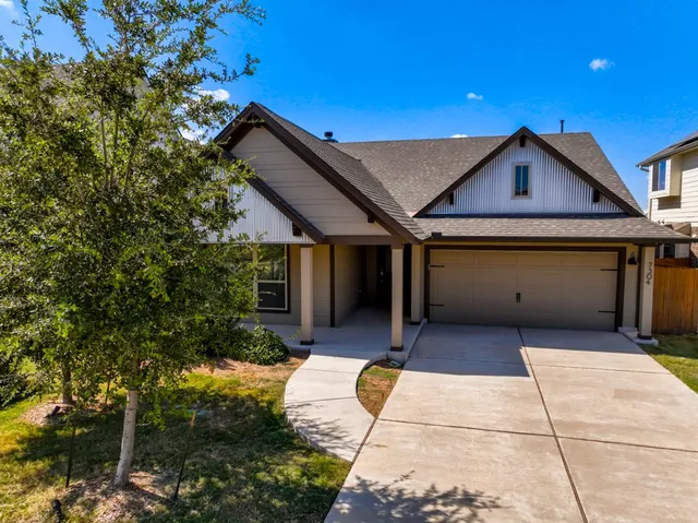 a house view with a outdoor space