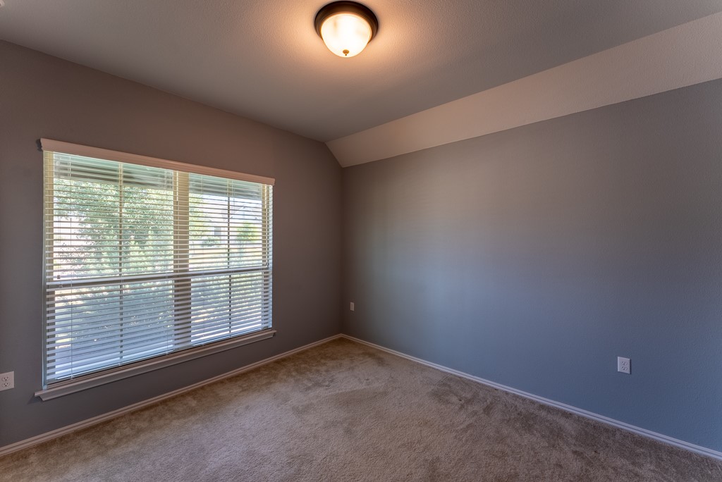 7304 Van Ness Street Austin, TX 78744 - Photo 5 of 37 an empty room with windows