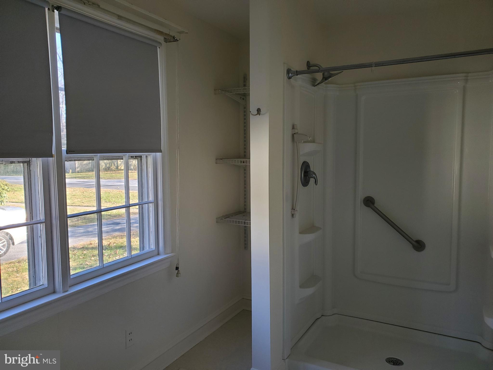 102 Harrison Avenue Camden Wyoming, DE 19934 - Photo 32 of 50 Walk in shower with grab bar