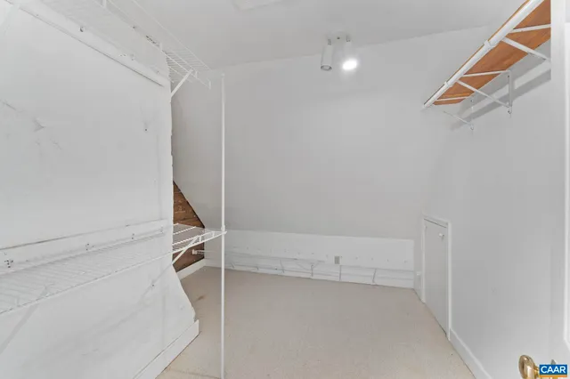 a bathroom with a bathtub toilet and a shower