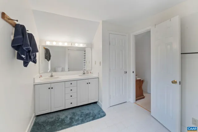 a work space with wooden floor and furniture