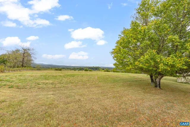 a view of a swimming pool with an ocean view