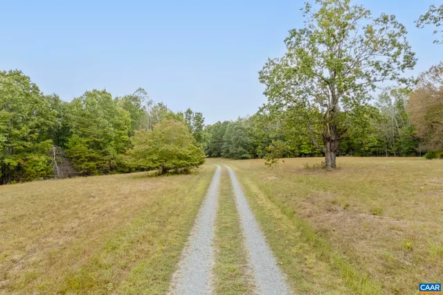 a view of a lake with a city