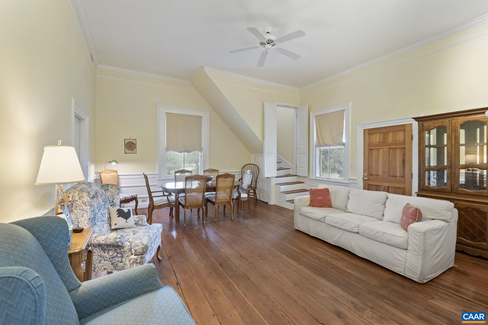 12534 Howardsville Road Howardsville, VA 24562 - Photo 6 of 45 a living room with furniture and wooden floor