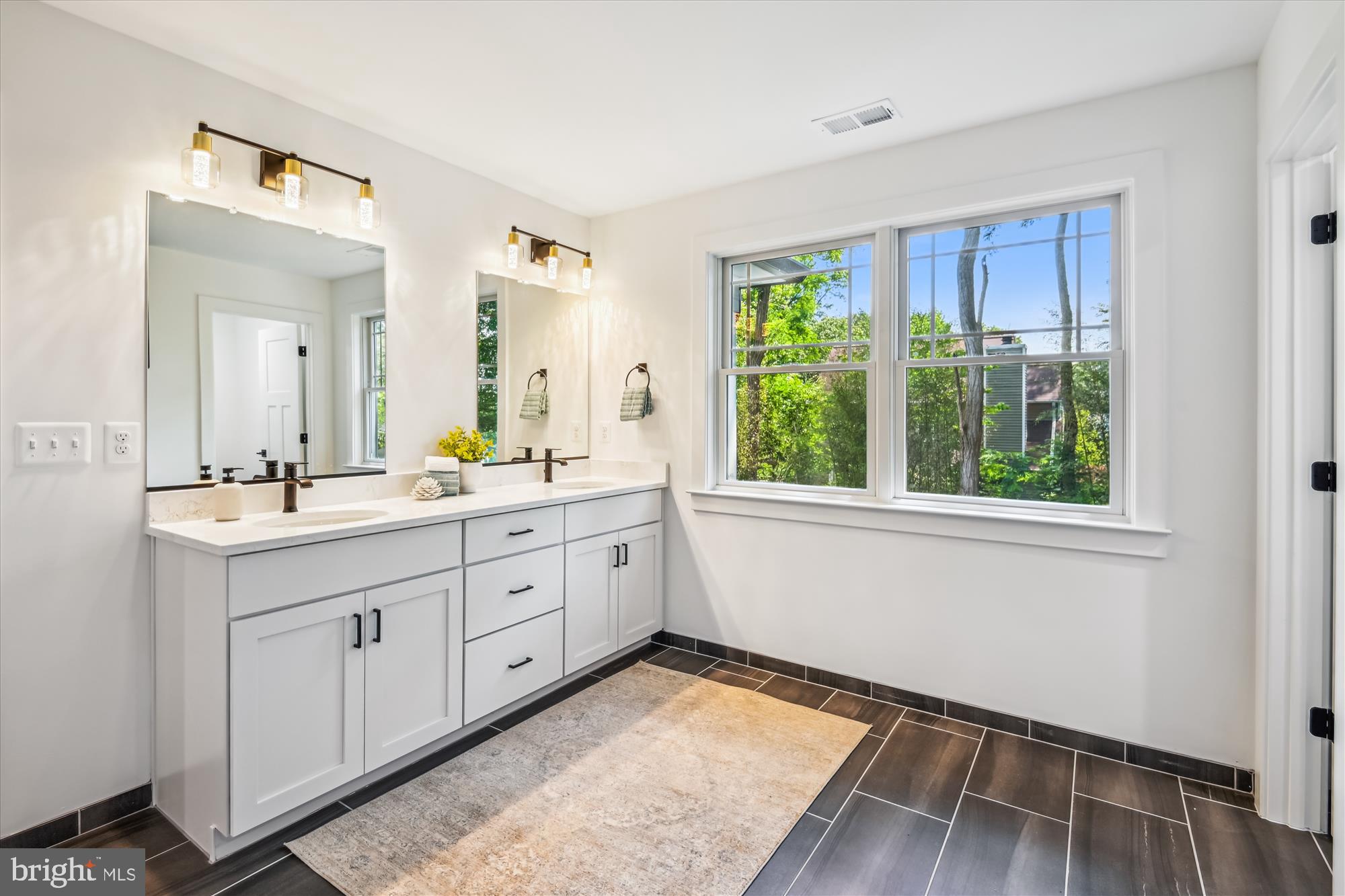 1603 Winchester Road Arnold, MD 21012 - Photo 25 of 39 a spacious bathroom with 2 sink tub and a mirror